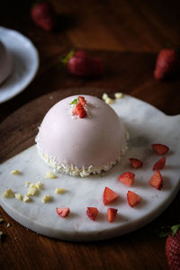 Close-up of cake served on table