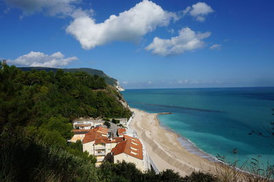 Beautiful view of adriatic sea from.numana, italy during summer on sunny day with blue and cloud sky 