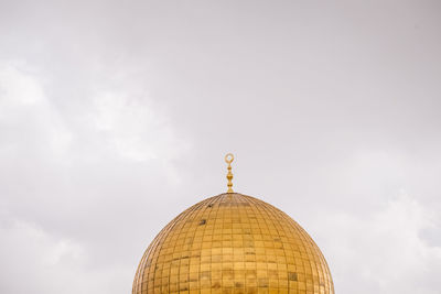 Low angle view of traditional building against sky