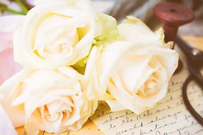 Close-up of white rose bouquet on table