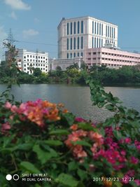 View of city buildings against sky