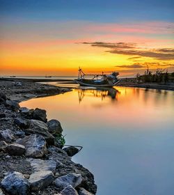 Scenic view of sea against sky during sunset