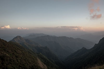 Scenic view of mountains against sky during sunset