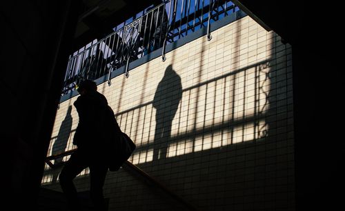 Silhouette of woman in dark background