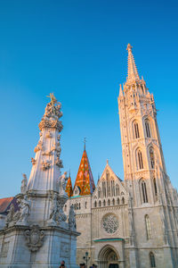 Low angle view of temple building against clear sky