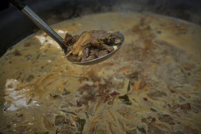 High angle view of meat in bowl on table