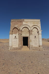 View of historic building against clear blue sky