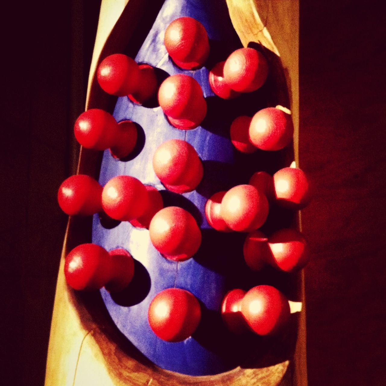 indoors, large group of objects, red, still life, abundance, arrangement, in a row, wood - material, table, multi colored, high angle view, food and drink, variation, food, no people, close-up, stack, order, decoration, choice