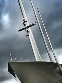 Low angle view of yacht against sky