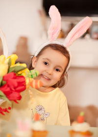 Portrait of cute girl with flowers