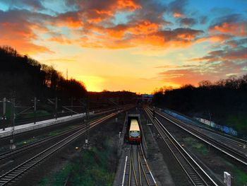 High angle view of train against sky during sunset