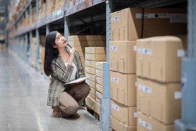 Young woman sitting in a building