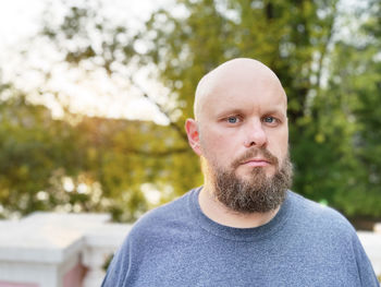 Portrait of man against trees