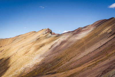 Panoramic view of rocky mountains against sky