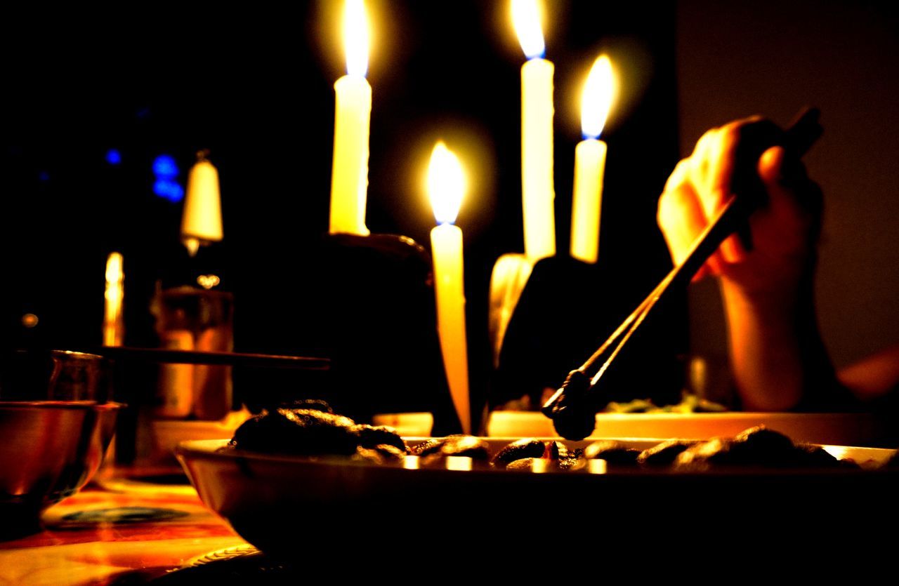 indoors, flame, burning, heat - temperature, candle, fire - natural phenomenon, food and drink, close-up, glowing, illuminated, table, lit, candlelight, still life, focus on foreground, fire, food, freshness, selective focus, no people