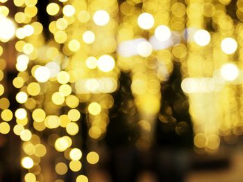 Defocused image of illuminated lights at night