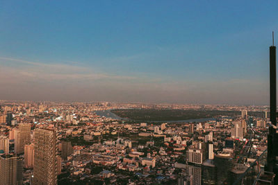 High angle view of cityscape against sky during sunset