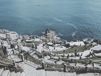 High angle view of buildings by sea