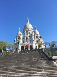 View of historic building against clear blue sky