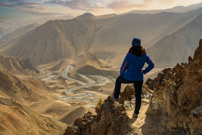 Rear view of woman on mountains