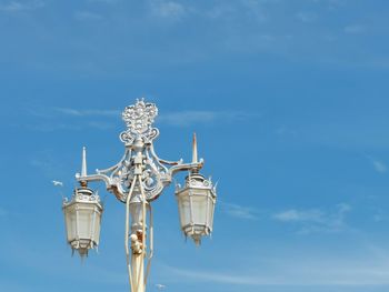 Low angle view of statue against sky