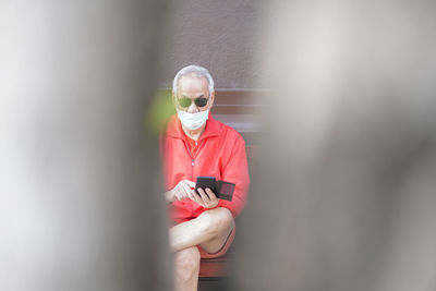 Portrait of man wearing sunglasses outdoors