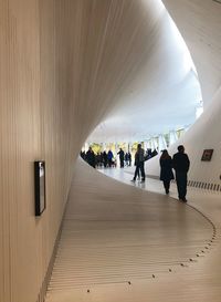 People walking in tunnel