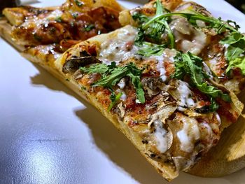 High angle view of pizza in plate on table