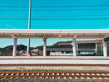 Railroad station platform against sky