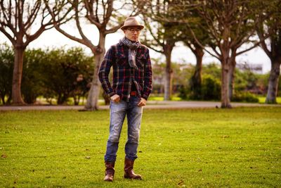 Full length of man standing on field