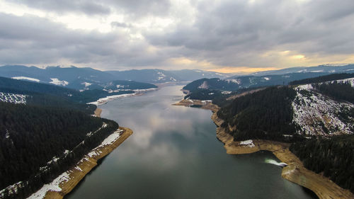 Panoramic view of river and mountains against sky