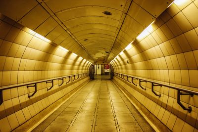 Empty subway along walls