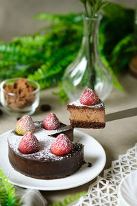 Close-up of strawberries in plate on table