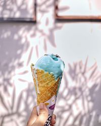 Woman holding ice cream cone