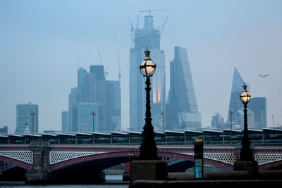 Modern buildings in city against sky