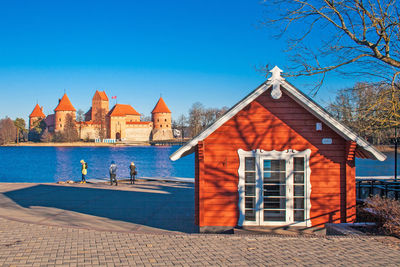 View of buildings against blue sky