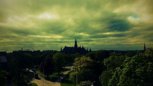 Scenic view of landscape against cloudy sky