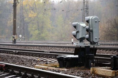 Railway signals amidst tracks