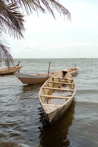 Boat in sea against sky