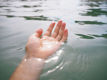 Low section of woman in water