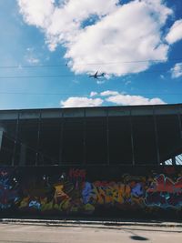 Built structure against cloudy sky