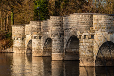 Arch bridge over river