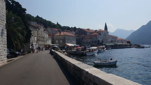 Panoramic view of sea and buildings against clear sky