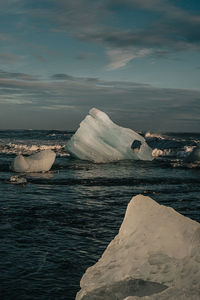 Scenic view of sea against sky during winter