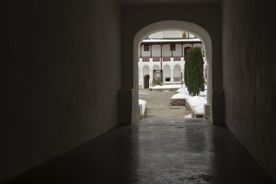 Empty alley amidst buildings