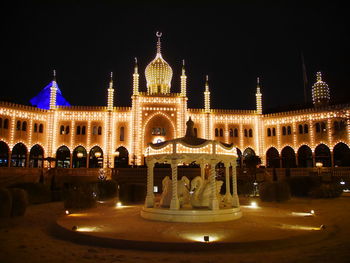 Illuminated building at night