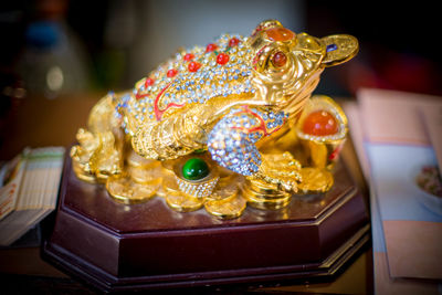 Close-up of an animal representation on table