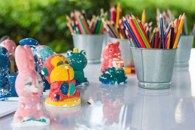 Close-up of multi colored toys on table