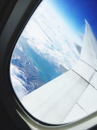 Aerial view of snow covered car window