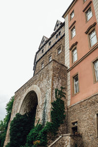 Low angle view of old building against sky